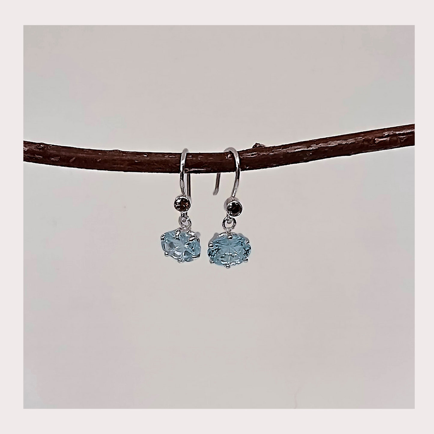 Handcarved blue topaz and swaroski crystal, sterling silver earrings