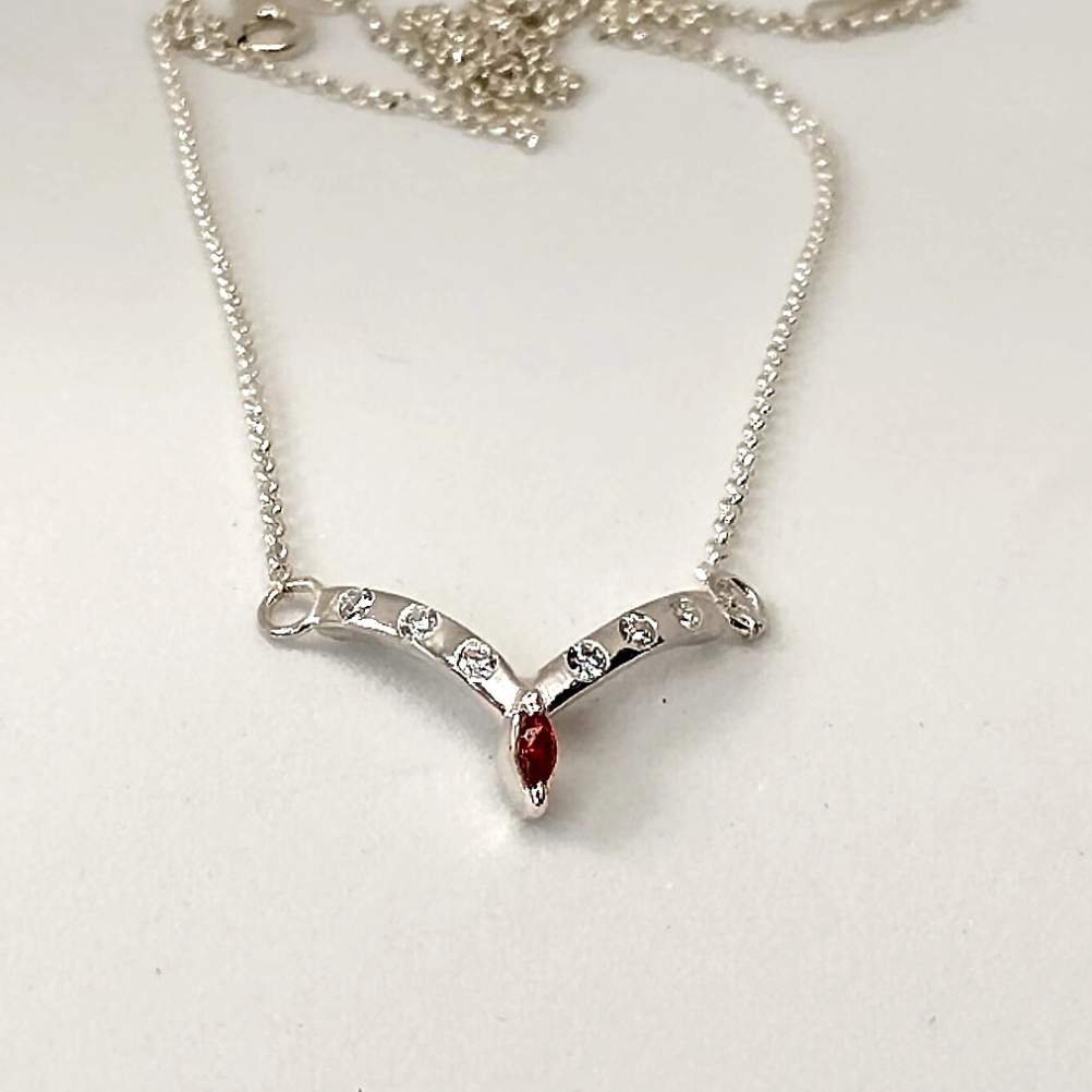 Garnet and cubic zirconia, wishbone necklace Sterling silver