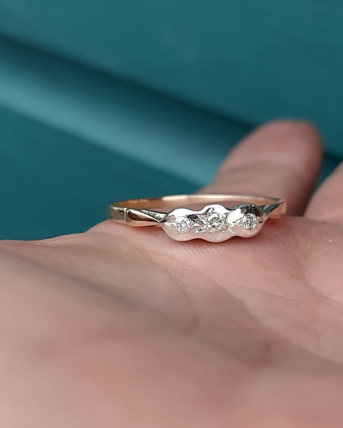 Restored antique gold and diamond ring with its original character preserved and the stone settings rebuilt.