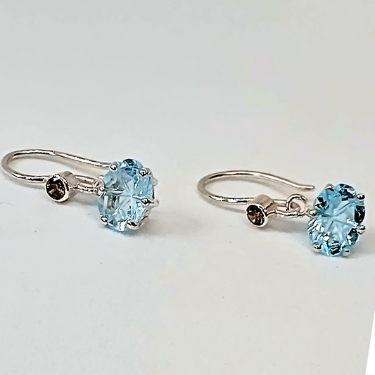 Handcarved blue topaz and swaroski crystal, sterling silver earrings